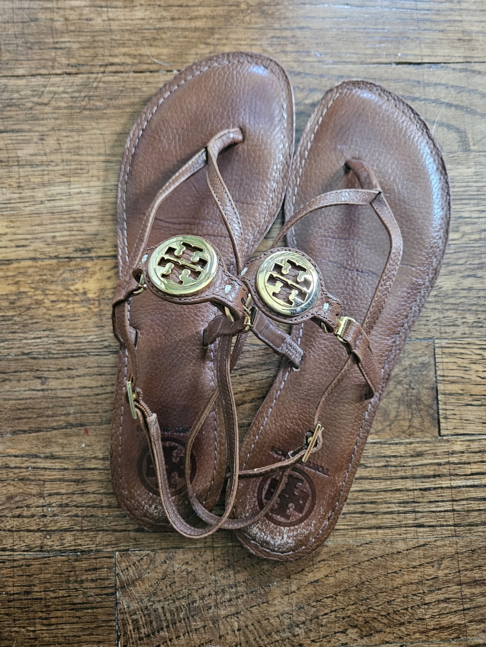 Tory Burch Cross Strap Brown Leather Moccasins with Logo Medallion